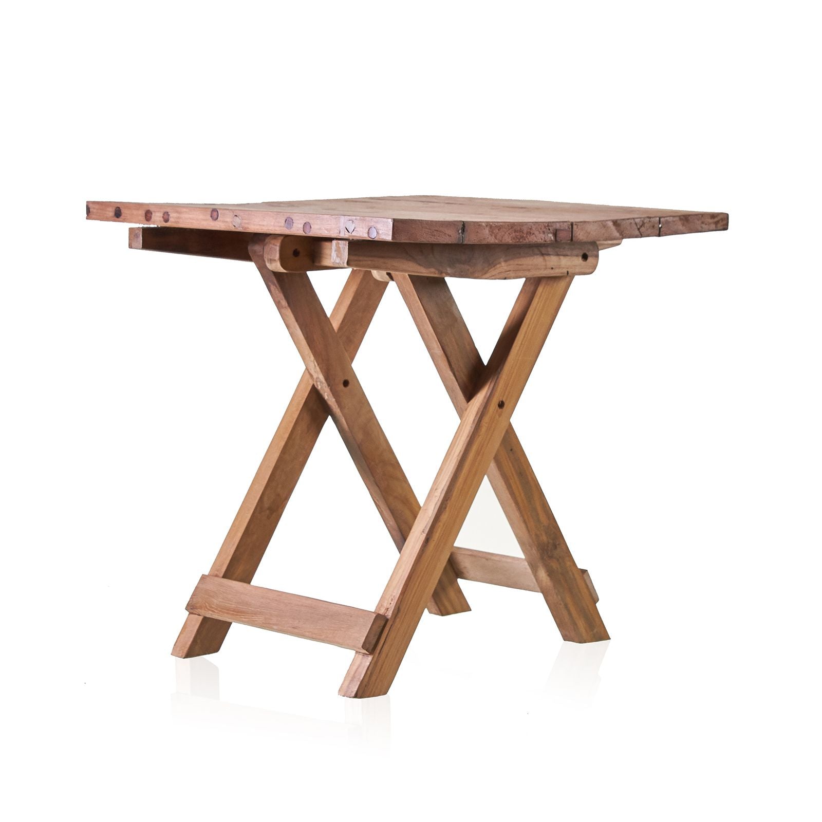 Wooden table with X-shaped legs on a white background