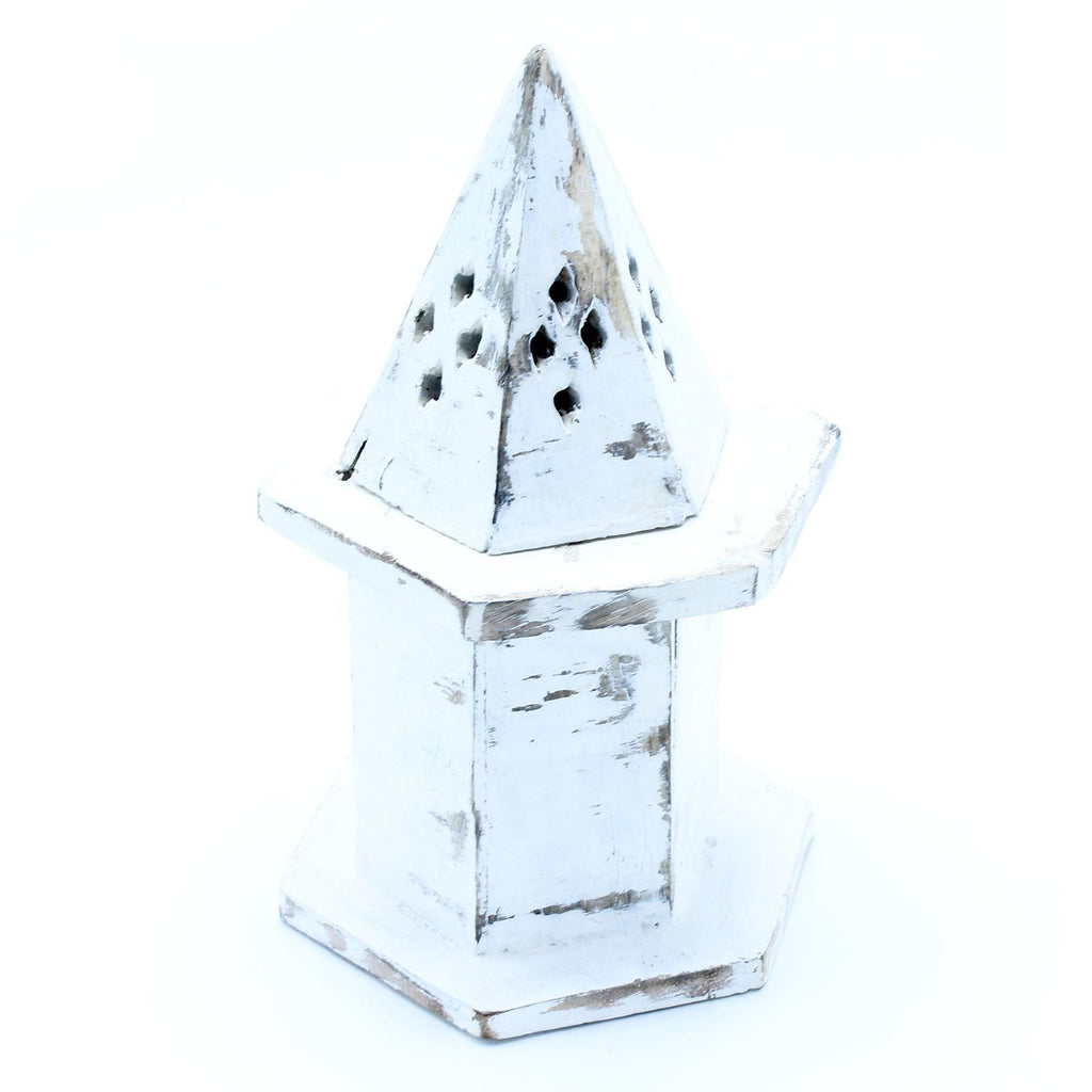 White decorative pyramid on a white background