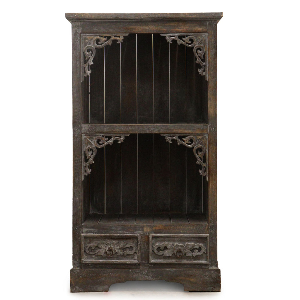 Vintage wooden cabinet with intricate carvings on a white background
