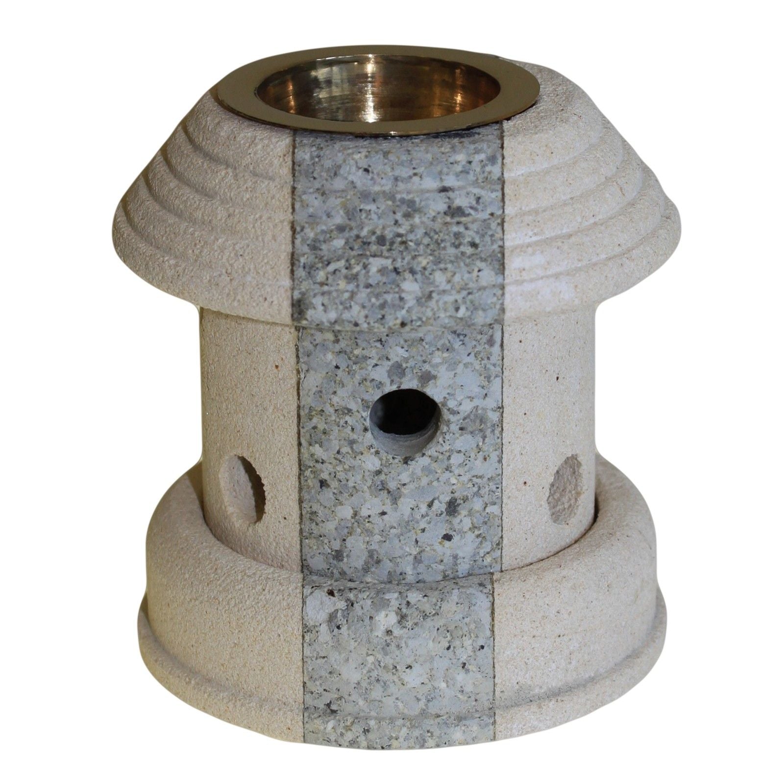 Decorative stone candle holder with brass interior on a white background