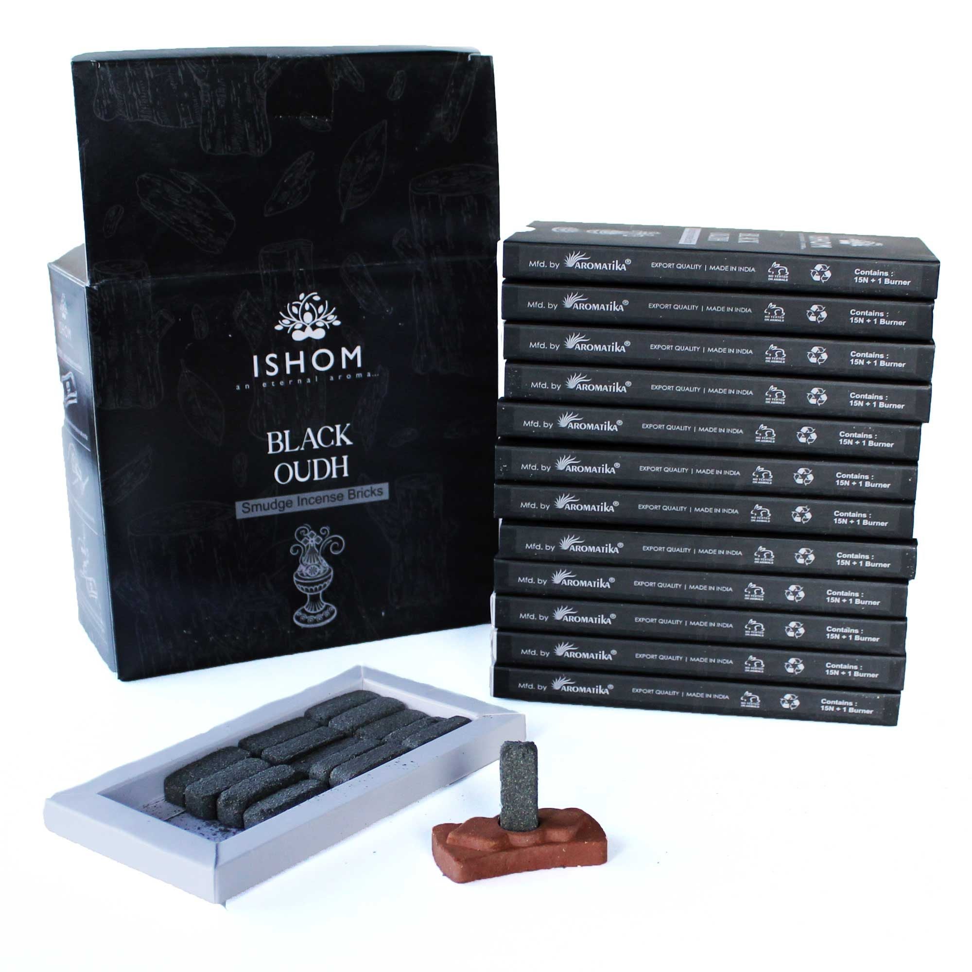 Ishom Black Oudh incense packaging with incense sticks and holder on a white background