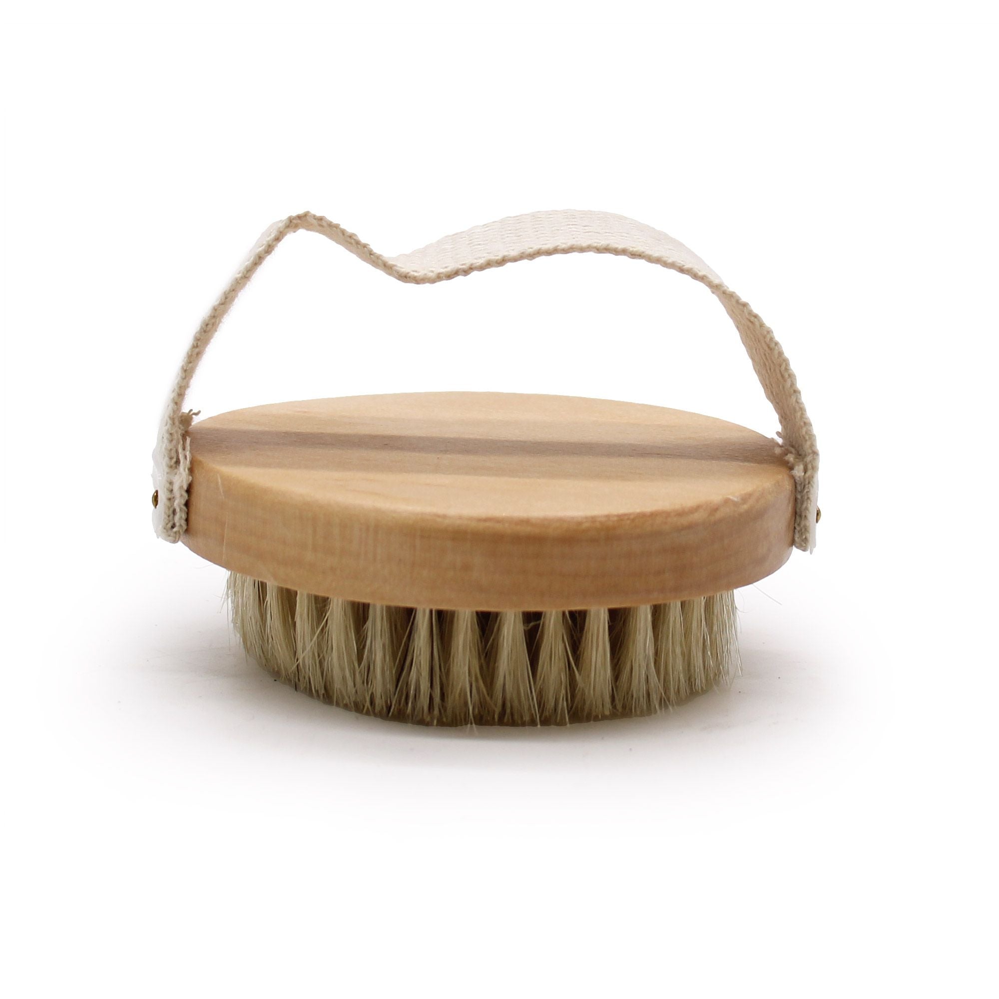 Wooden brush with bristles on a white background