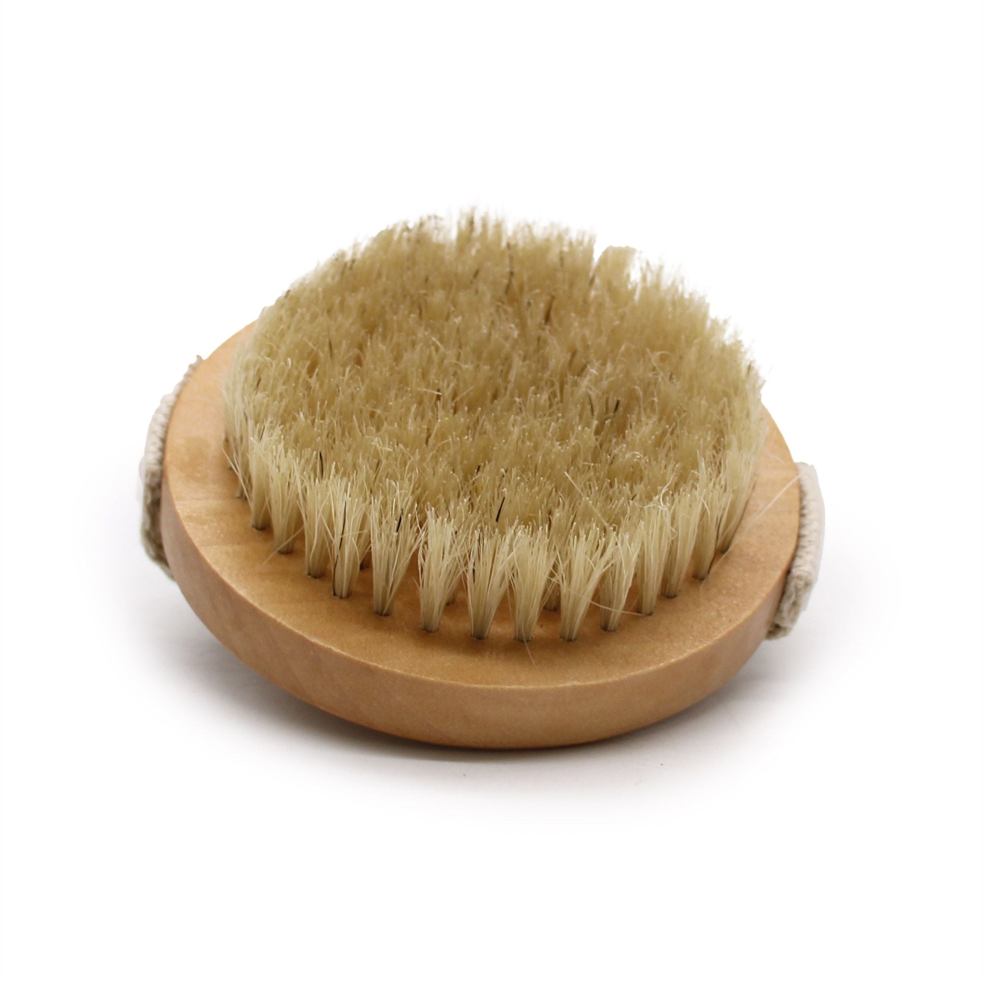 Wooden brush with natural bristles on a white background