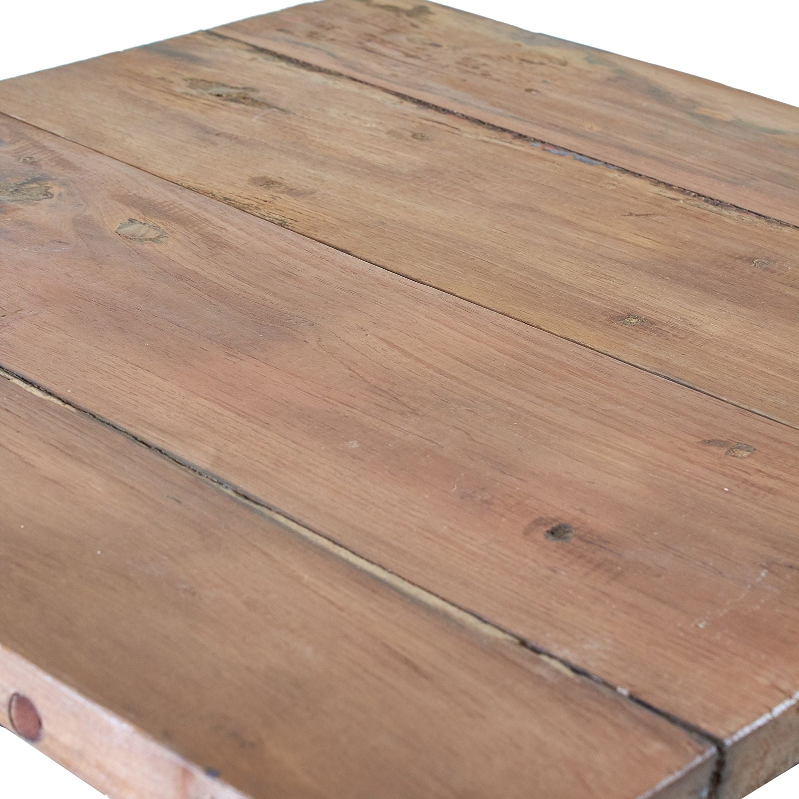 Close-up of a wooden surface with visible grain and texture