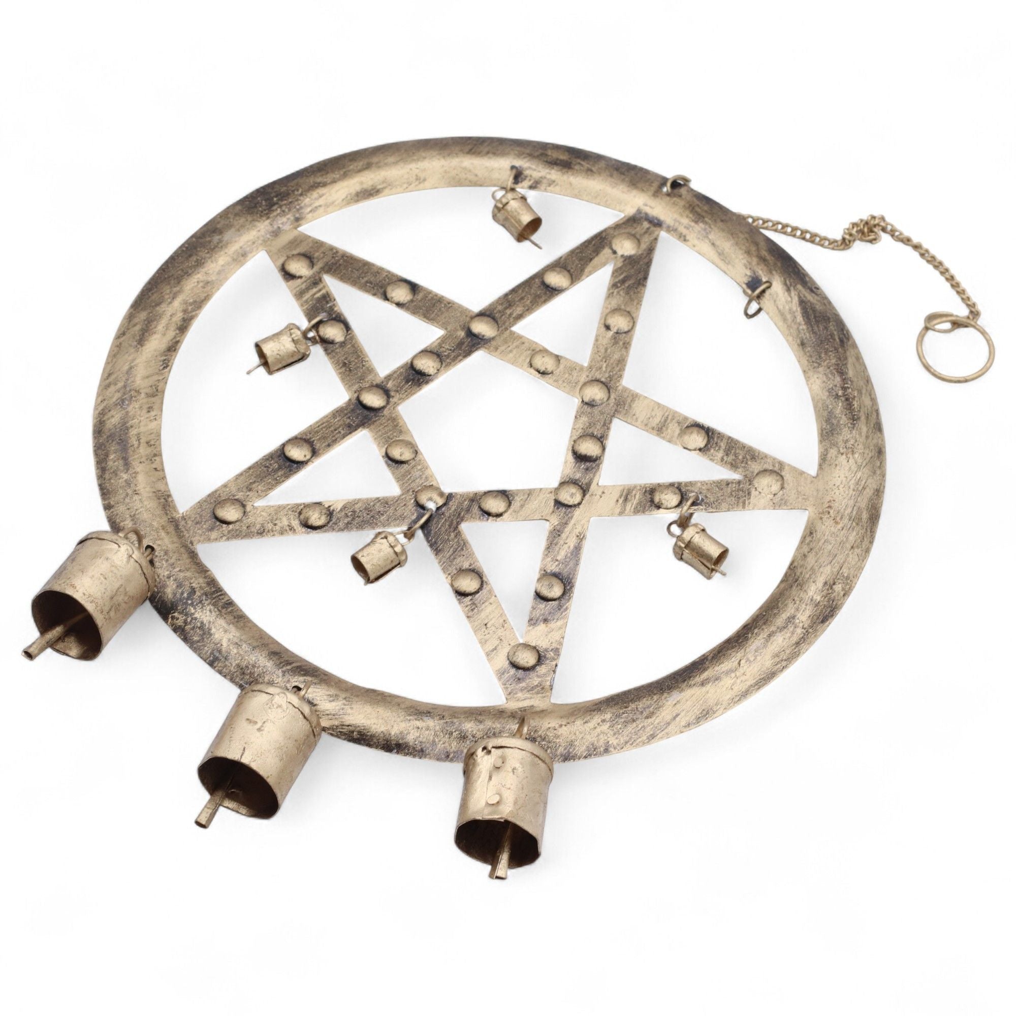 Decorative metal pentacle with candles on a white background