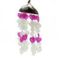 Decorative hanging with pink and white heart shapes on a white background