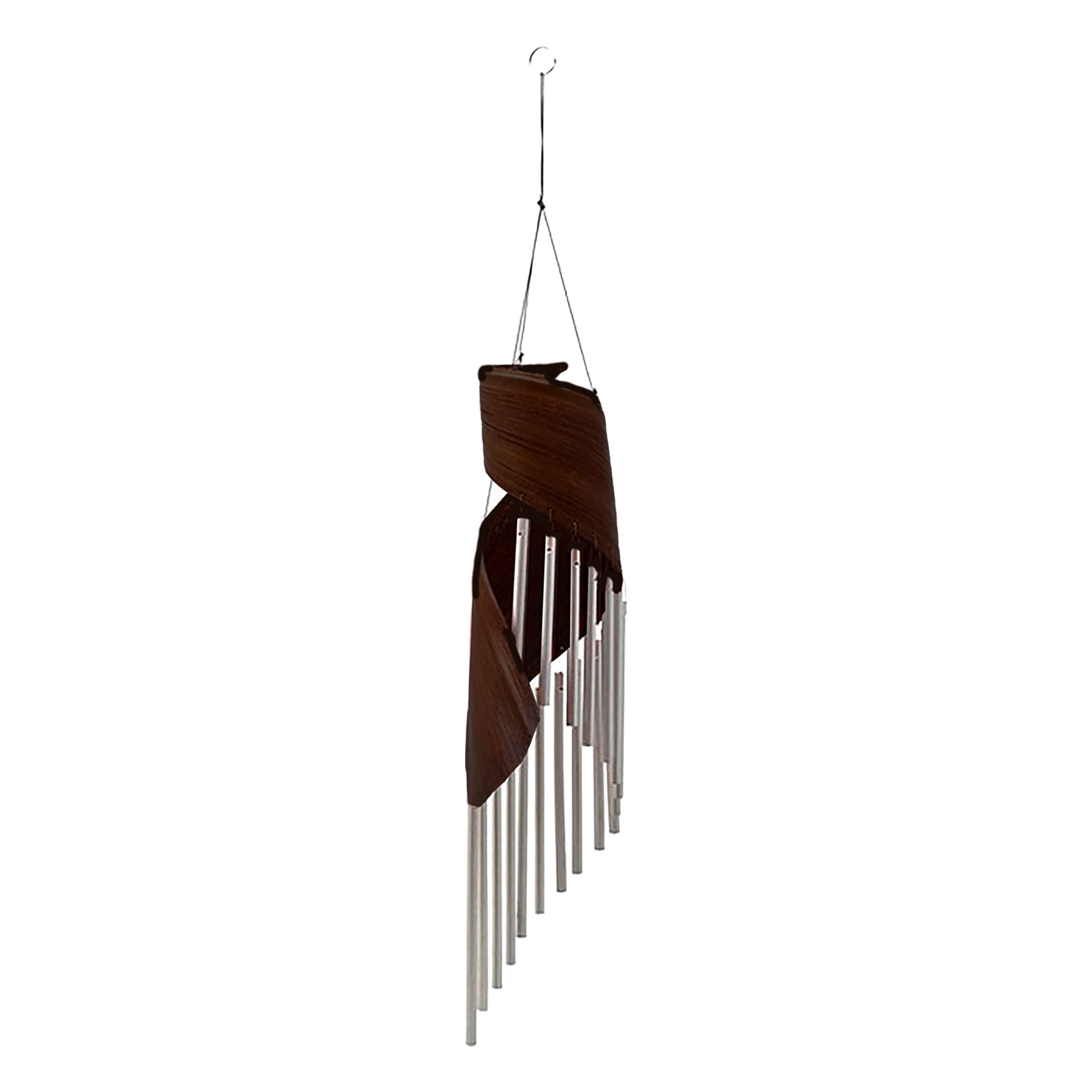 Decorative wind chime with brown and silver elements on a white background