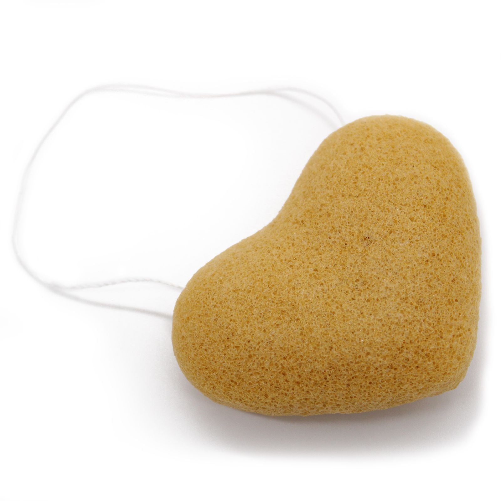 Heart-shaped sponge on a white background