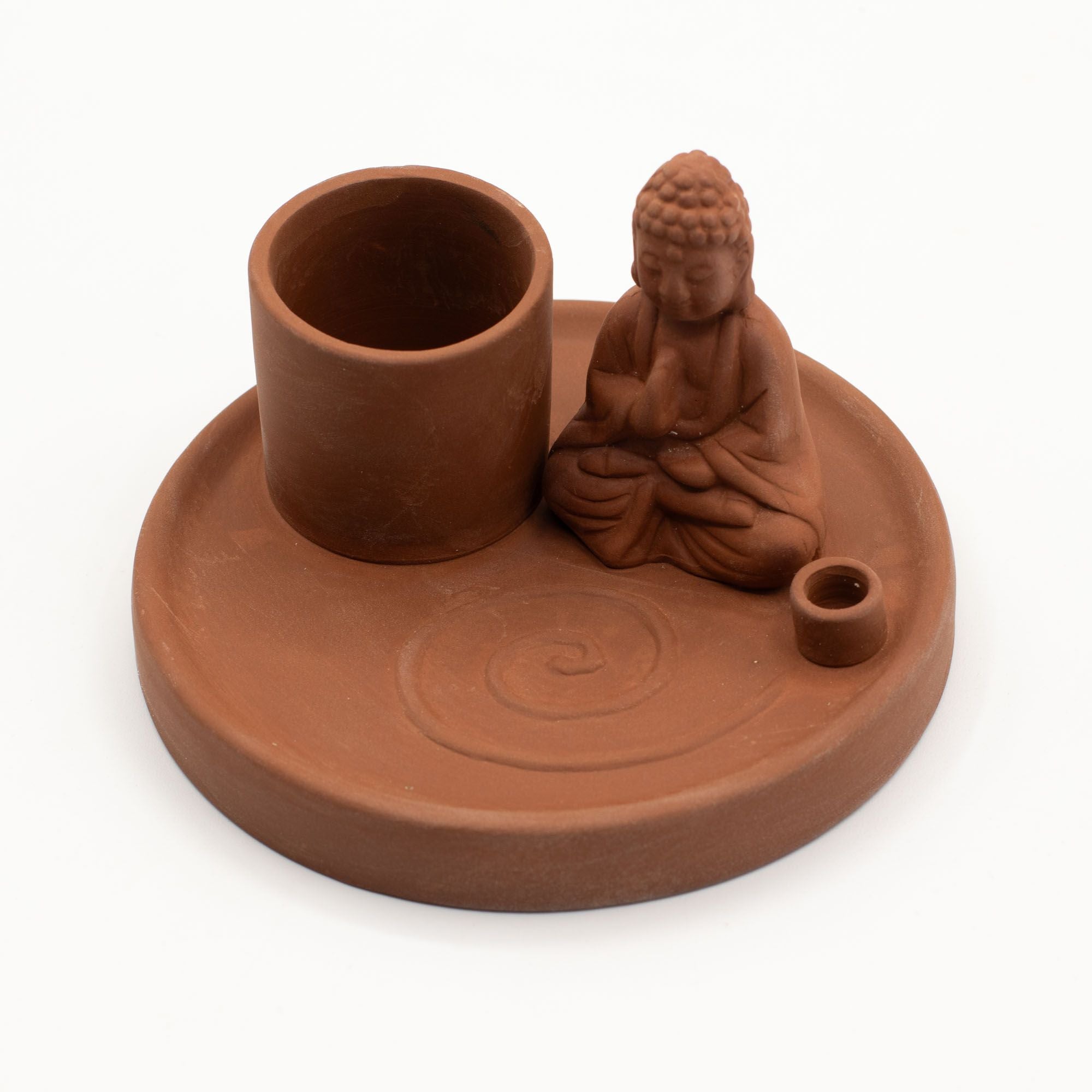 Terracotta candle holder with Buddha figure on a white background