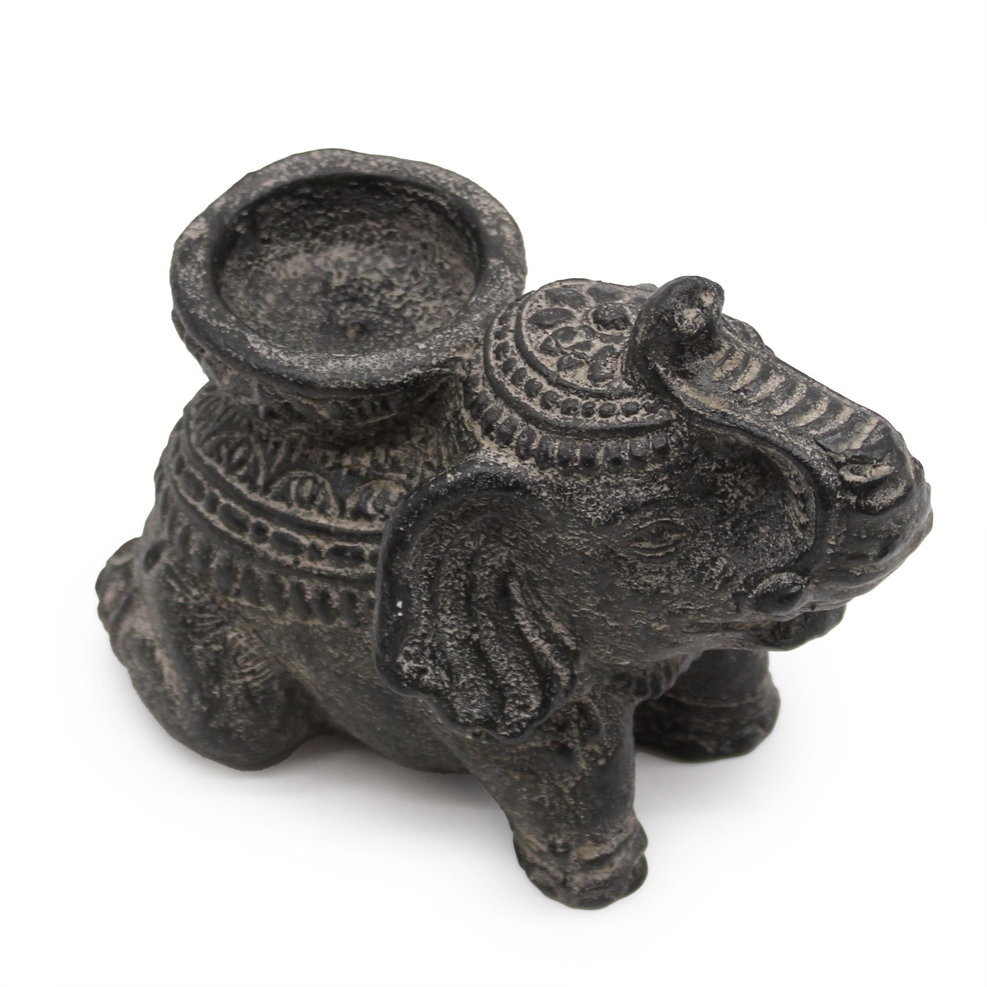Decorative elephant-shaped candle holder on a white background