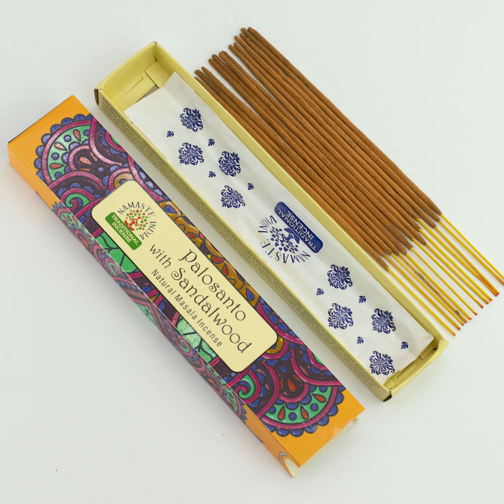 Incense sticks with a colorful box on a white background
