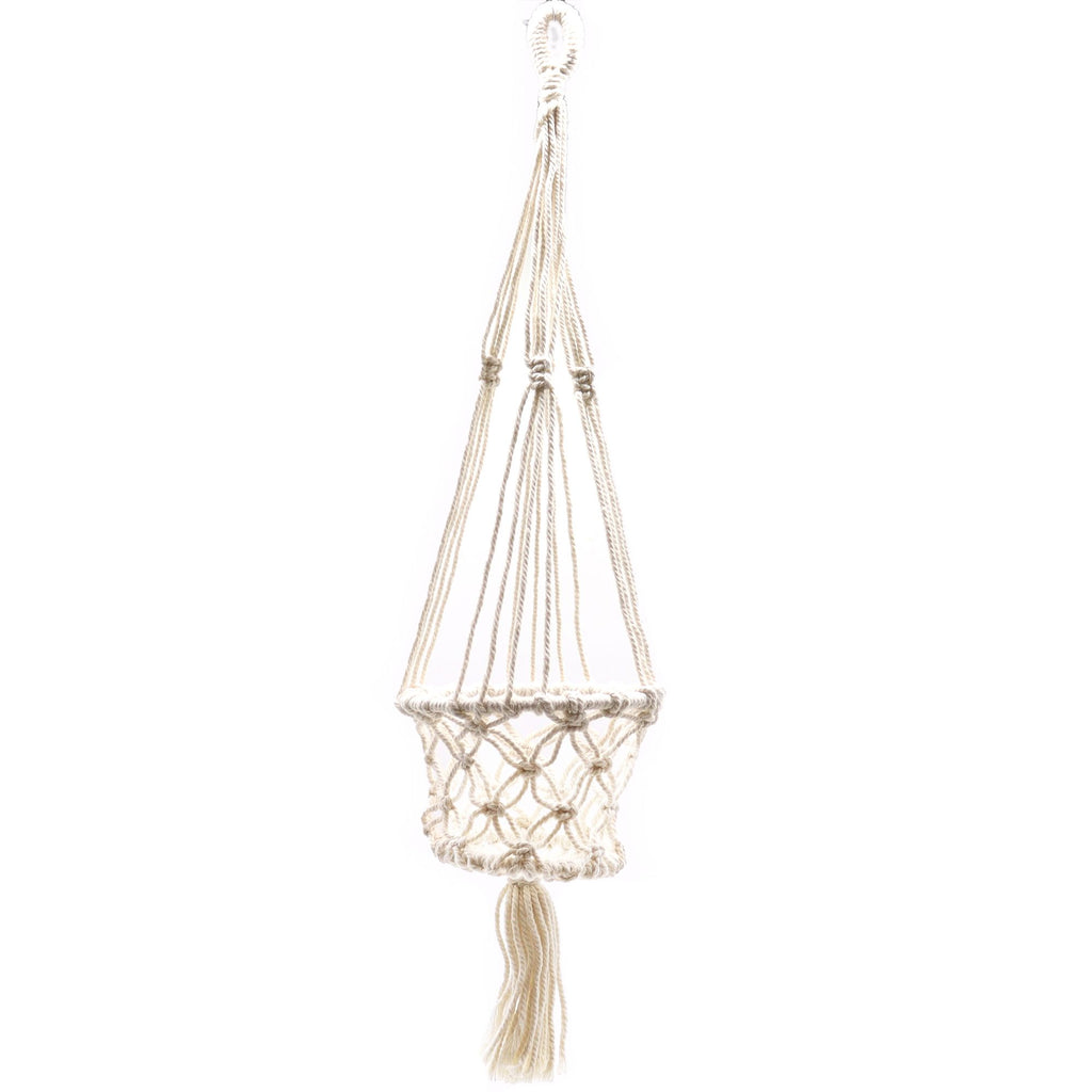 Macrame plant hanger with tassel on a white background
