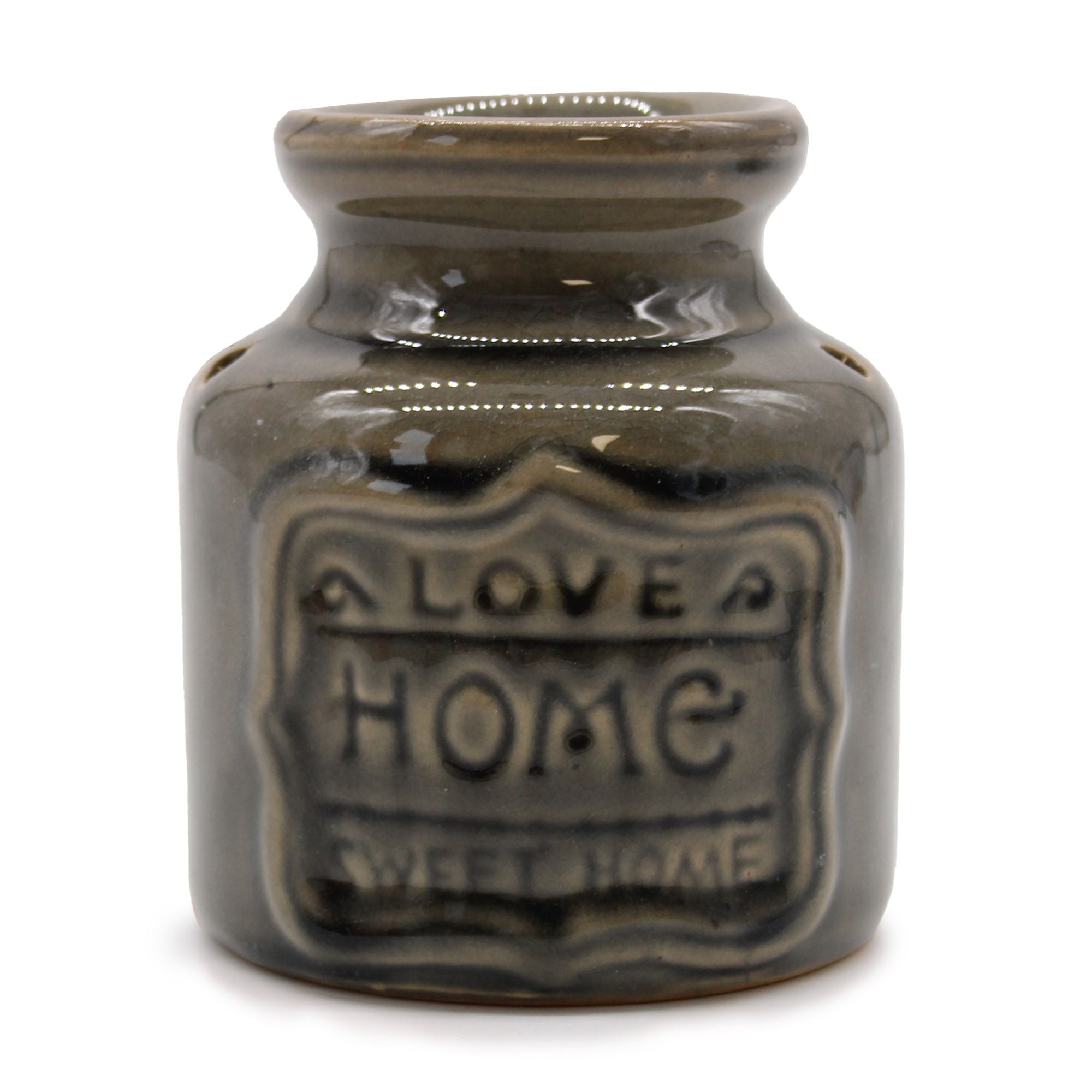 Ceramic jar with 'Love Home Sweet Home' text on a white background