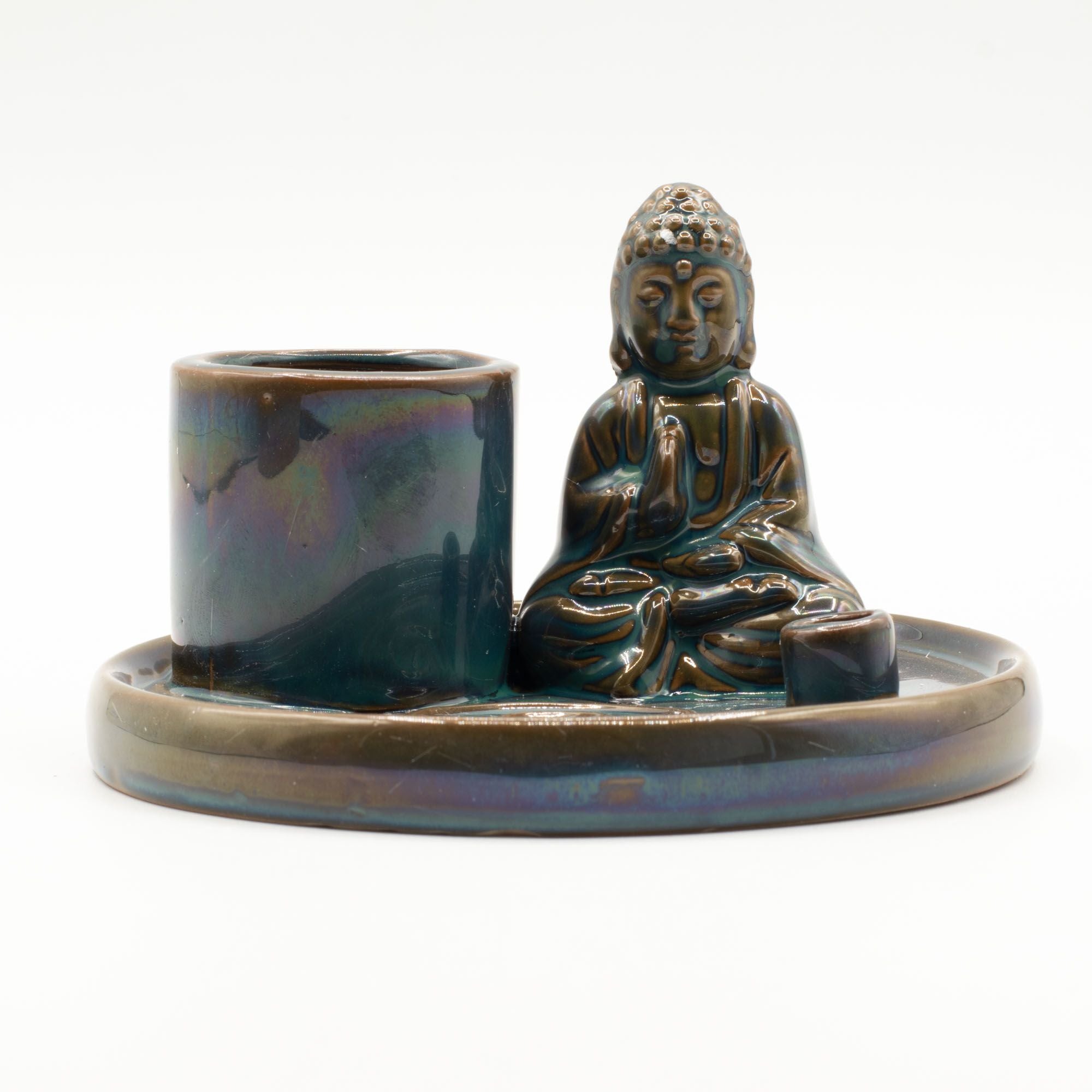 Ceramic incense burner with Buddha figure on a white background