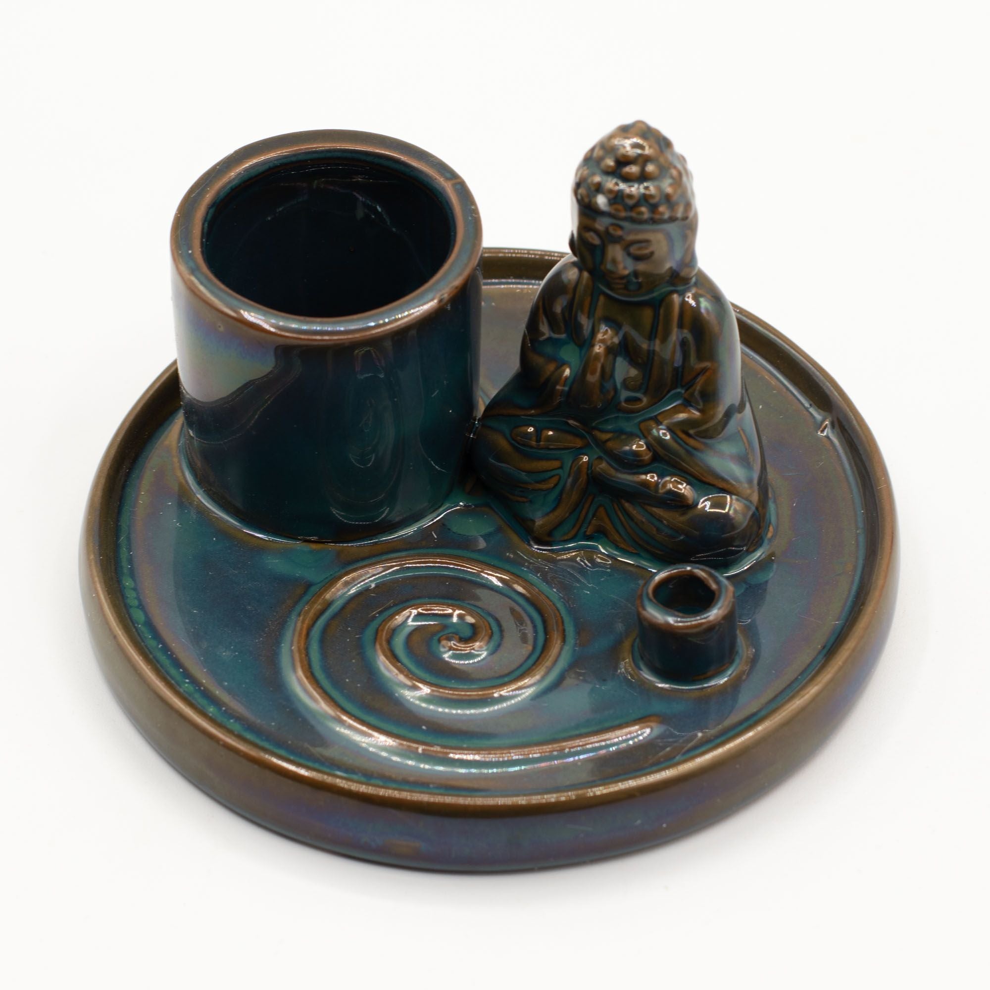 Ceramic incense burner with Buddha figure on a white background