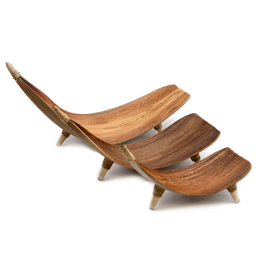 Wooden lounge chair with ottoman on a white background