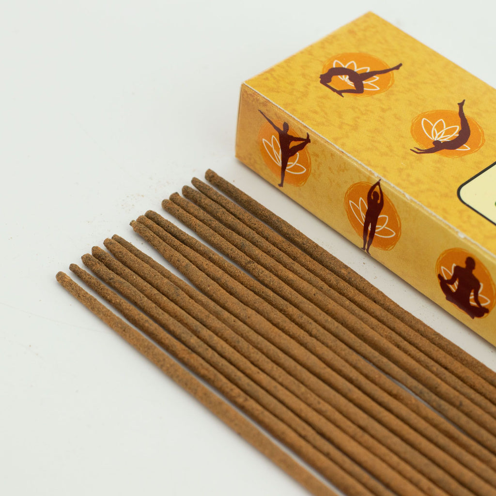 Incense sticks with a decorative box on a white background