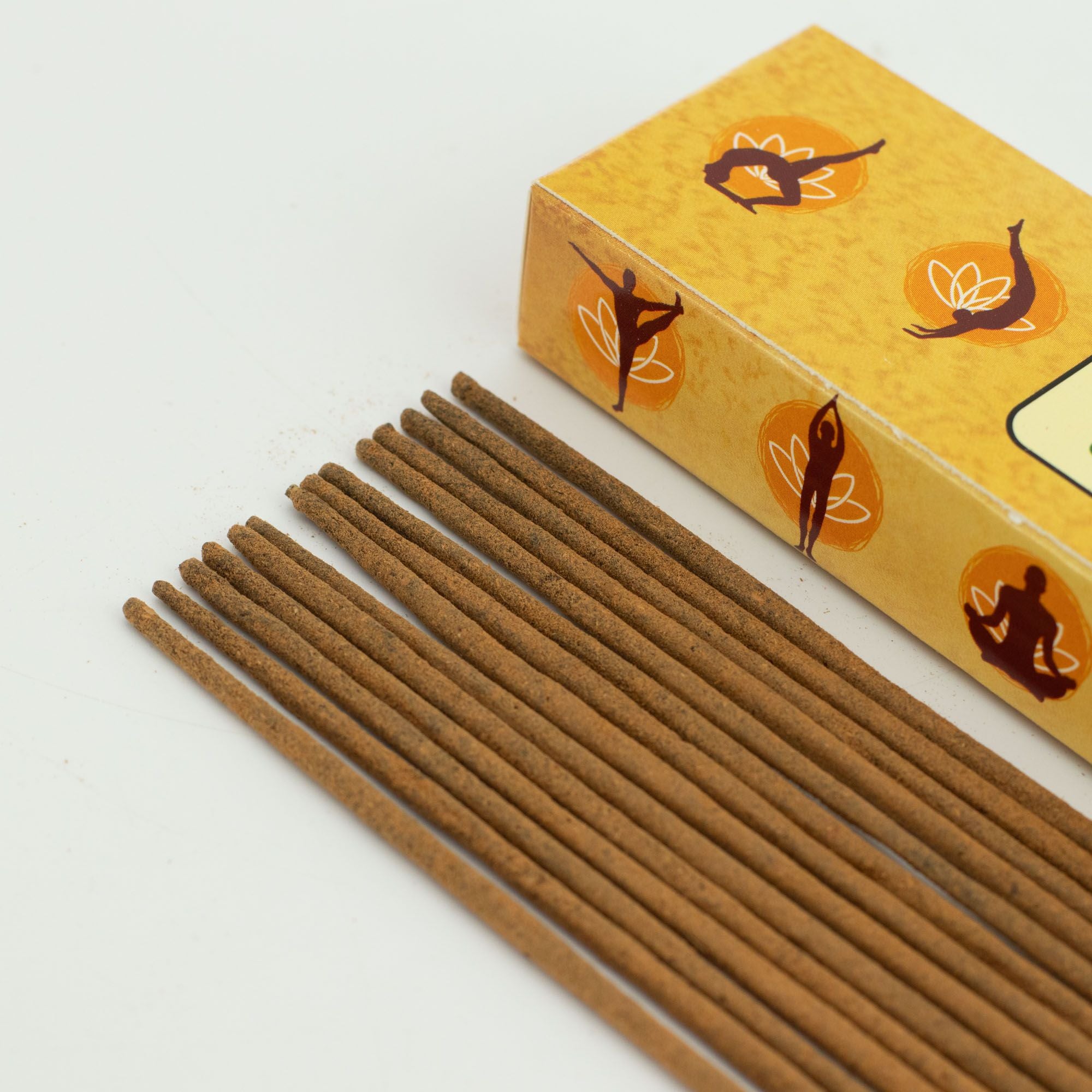 Incense sticks with a decorative box on a white background