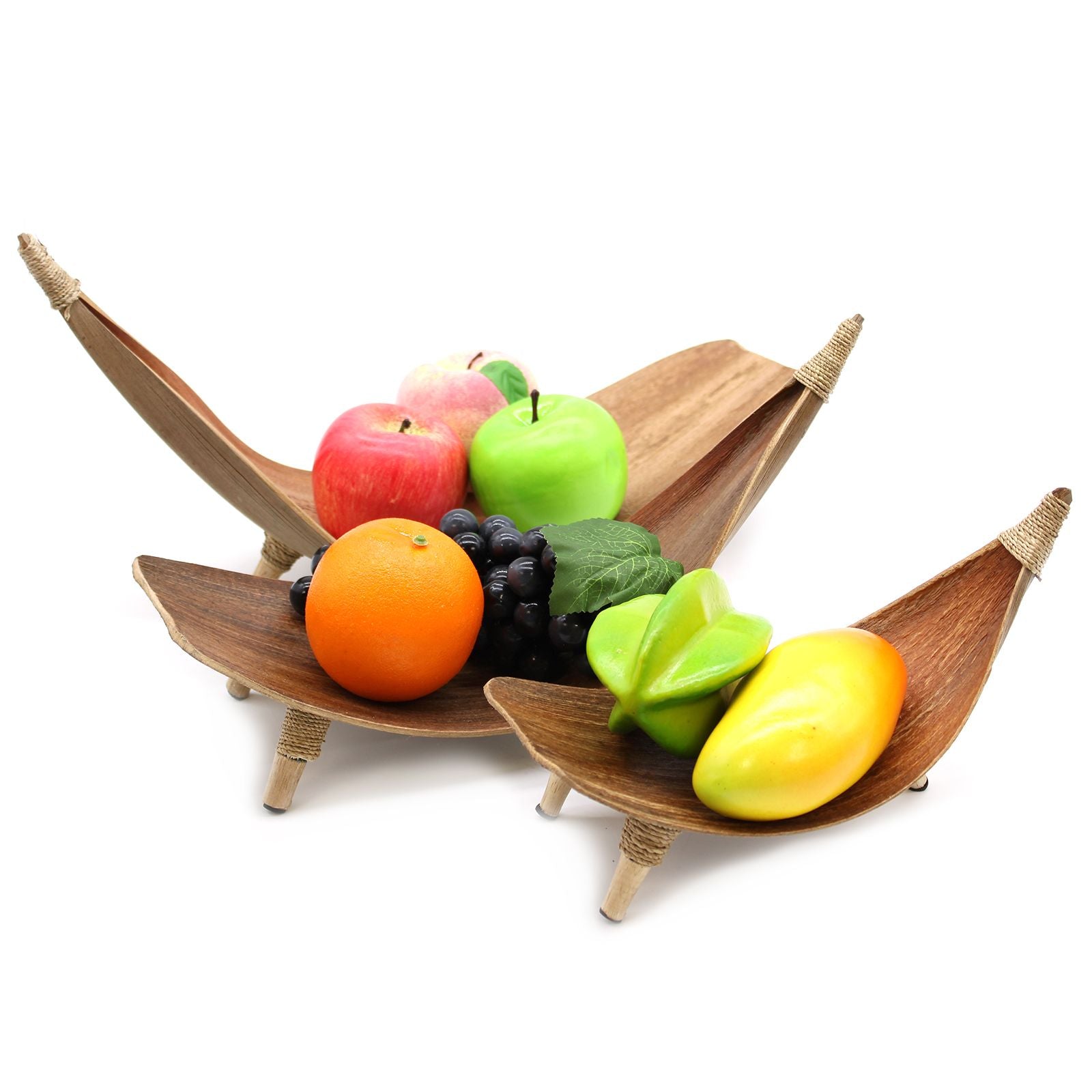 Wooden fruit basket with fruits on a white background