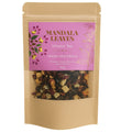Mandala Leaves infusion tea package with pink label on a white background