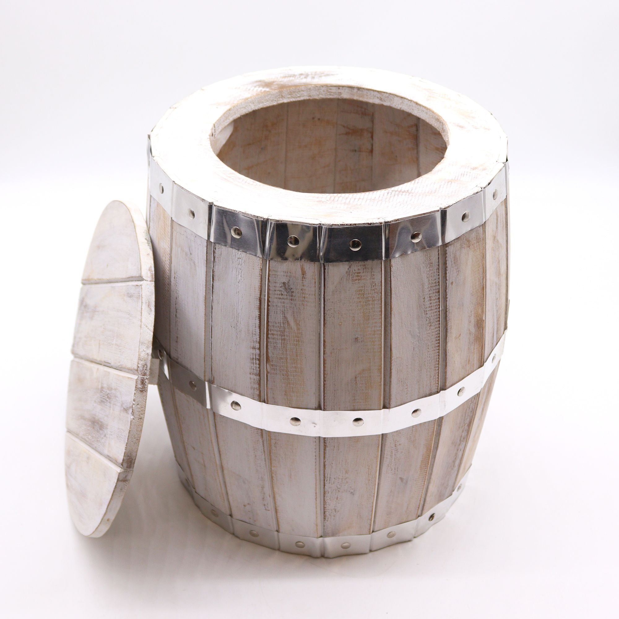 Wooden barrel with metal bands on a white background