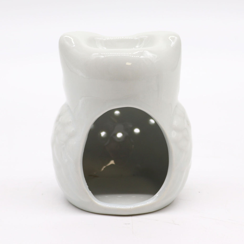 White ceramic wax warmer on a white background