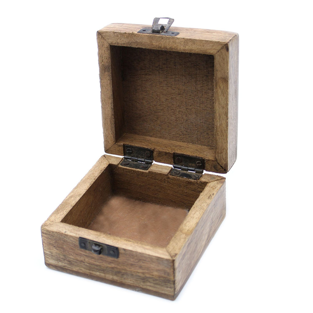 Wooden jewelry box with a hinged lid on a white background