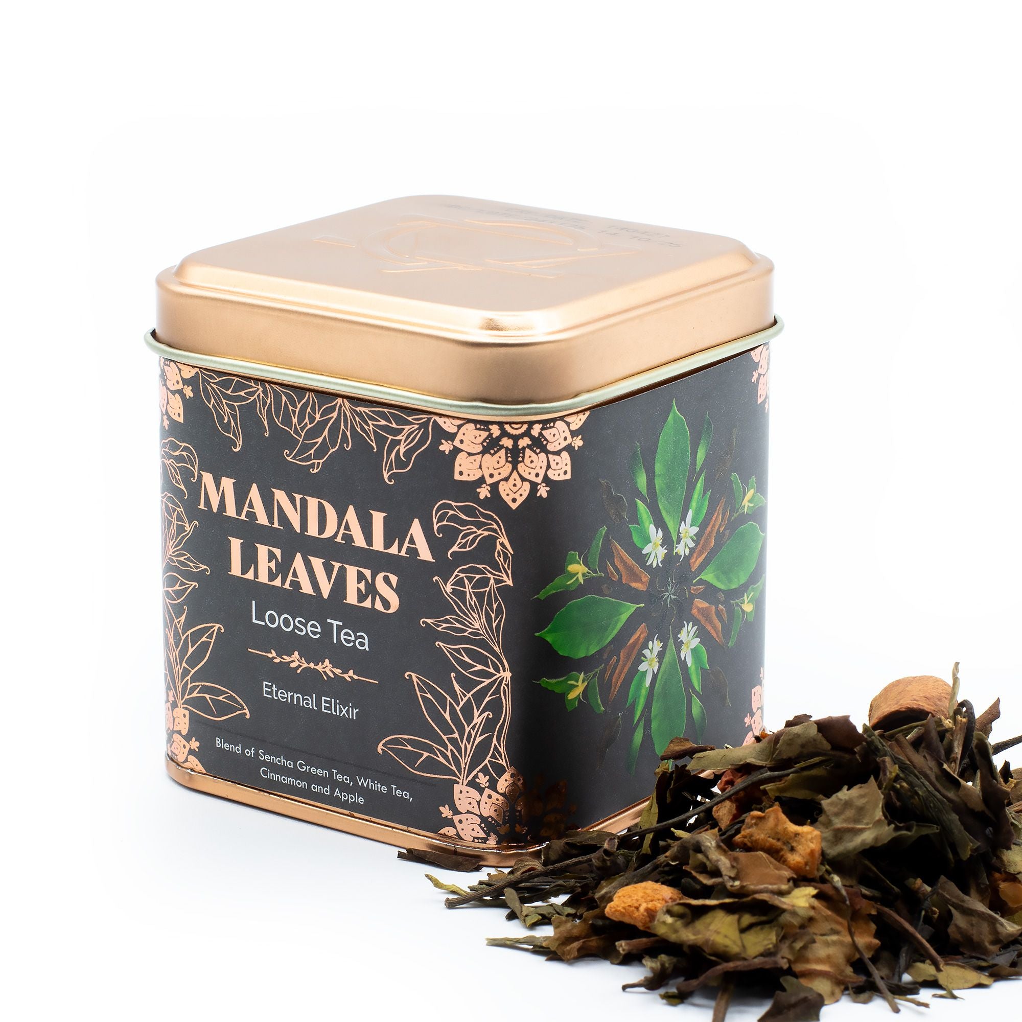 Tea tin labeled 'Mandala Leaves' with loose tea leaves on a white background