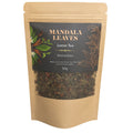 Tea package labeled 'Mandala Leaves' with a view of the tea leaves inside.