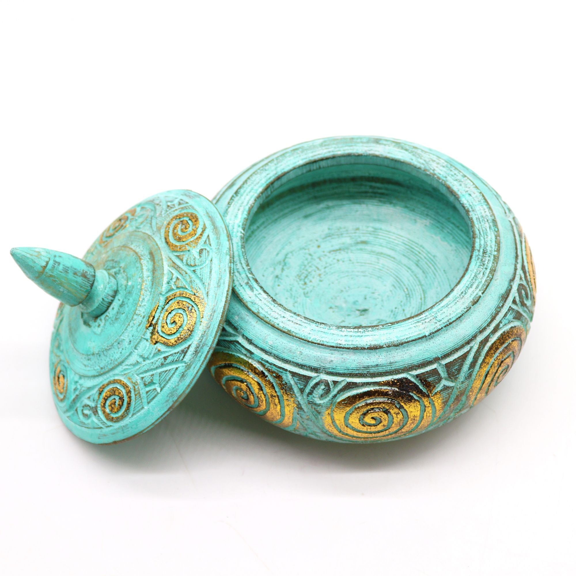 Turquoise decorative container with gold patterns on a white background