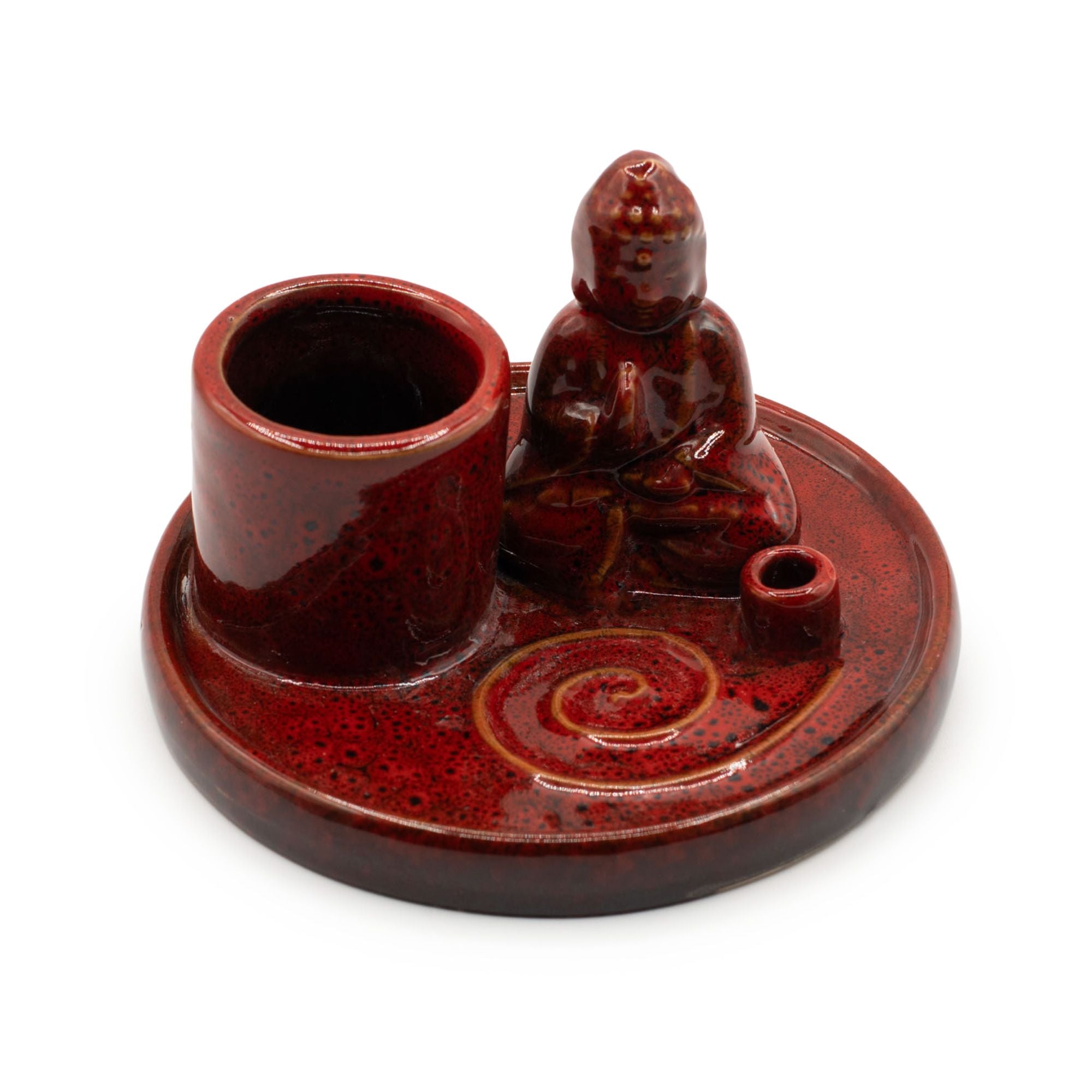 Red ceramic incense burner with a figurine on a white background