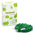 Box of Stamford Patchouli incense cones with green cones on a white background