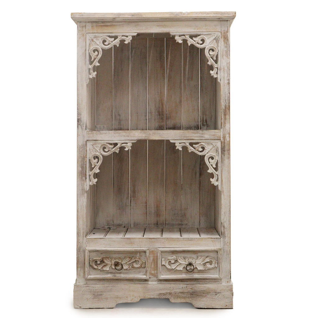 Wooden cabinet with decorative carvings on a white background