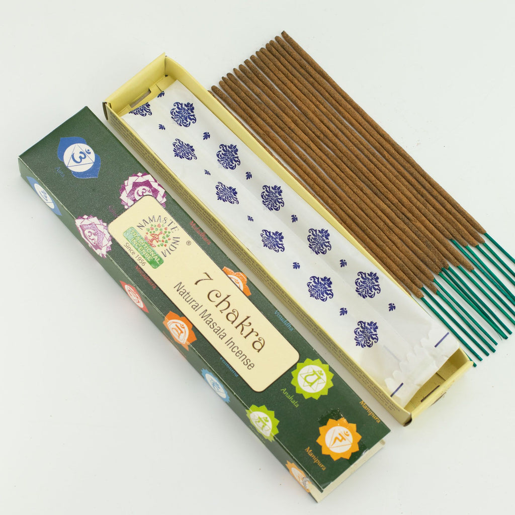 Incense sticks with their packaging on a white background