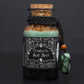 Bottle of 'Prosperity Bath Spell' bath potion with decorative label on a dark background
