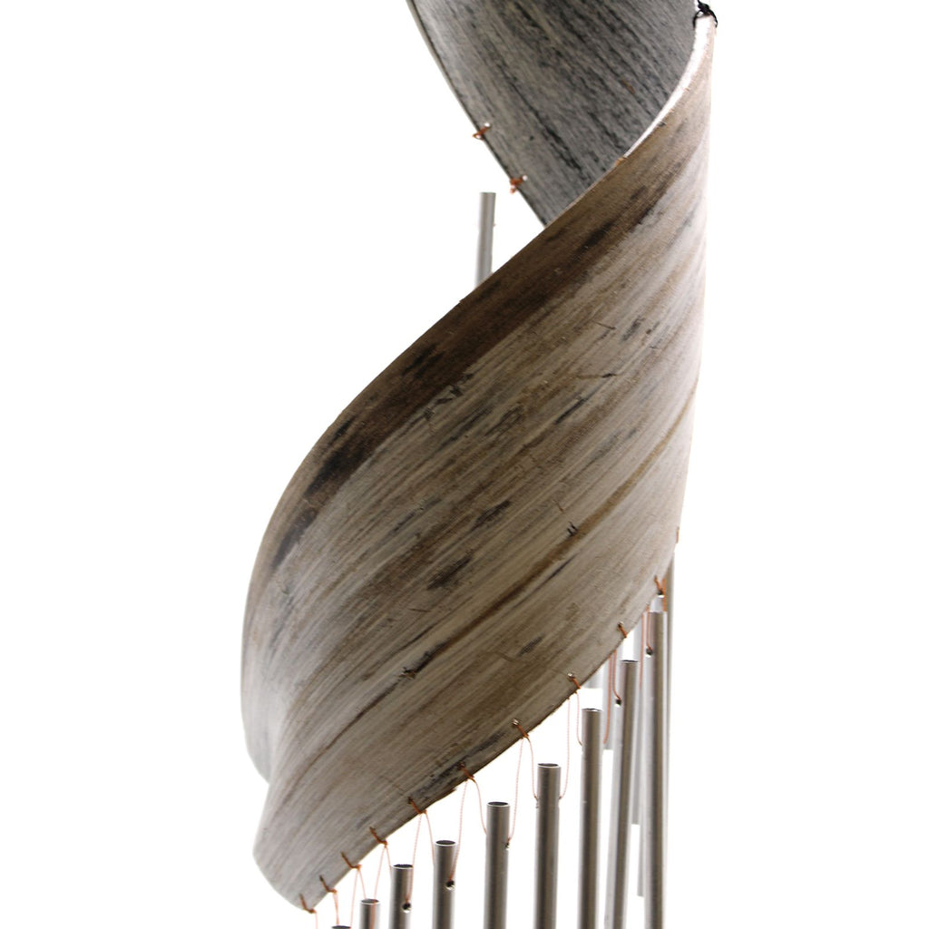 Wooden spiral staircase with metal balusters on a white background
