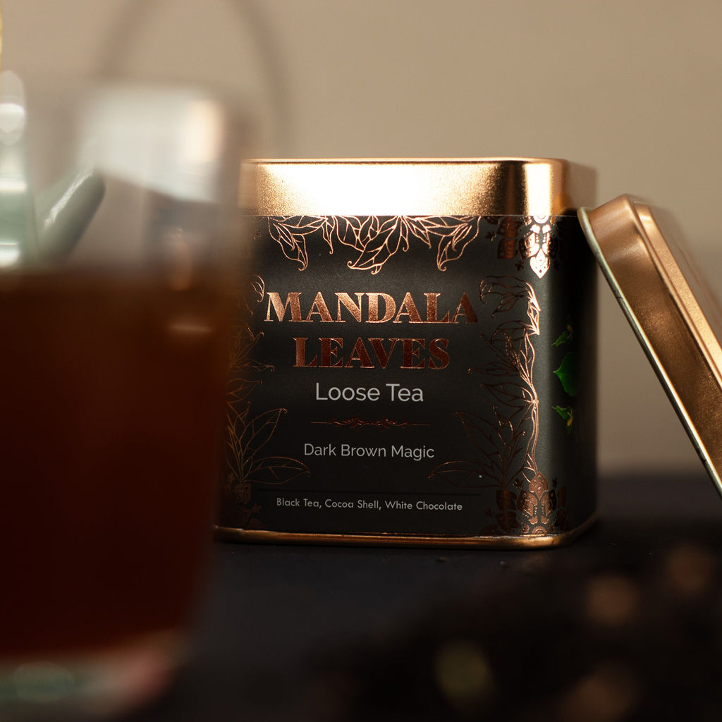 Mandala Leaves loose tea canister with a blurred background