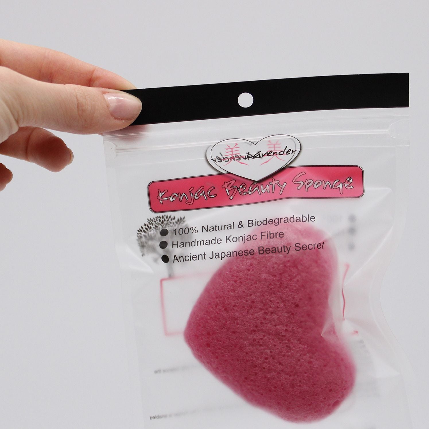 Konjac beauty sponge in a clear packaging with branding on a white background