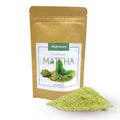 Gold packaging of premium ceremonial matcha with green powder on a white background