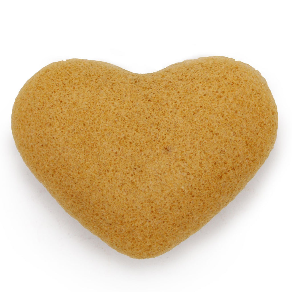 Heart-shaped sponge on a white background