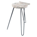 Small side table with marble-like top and metal legs on a white background