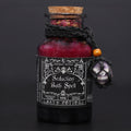 Bottle labeled 'Seduction Bath Spell' with decorative elements on a dark background