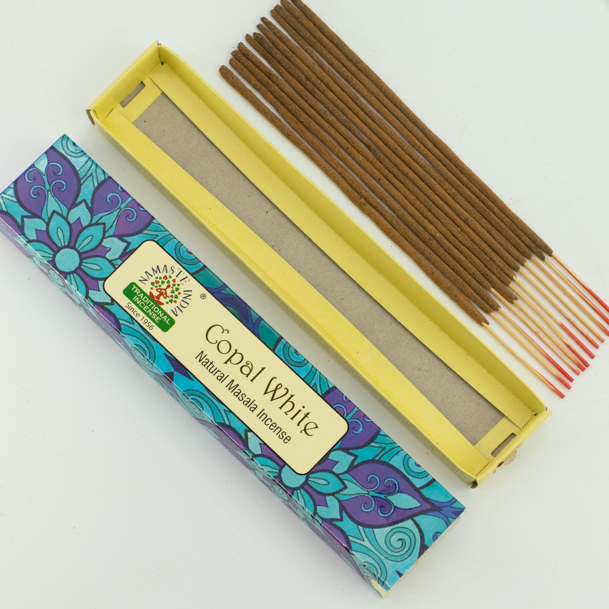 Copal White incense sticks with colorful packaging on a white background
