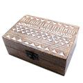 Wooden box with tribal patterns on a white background