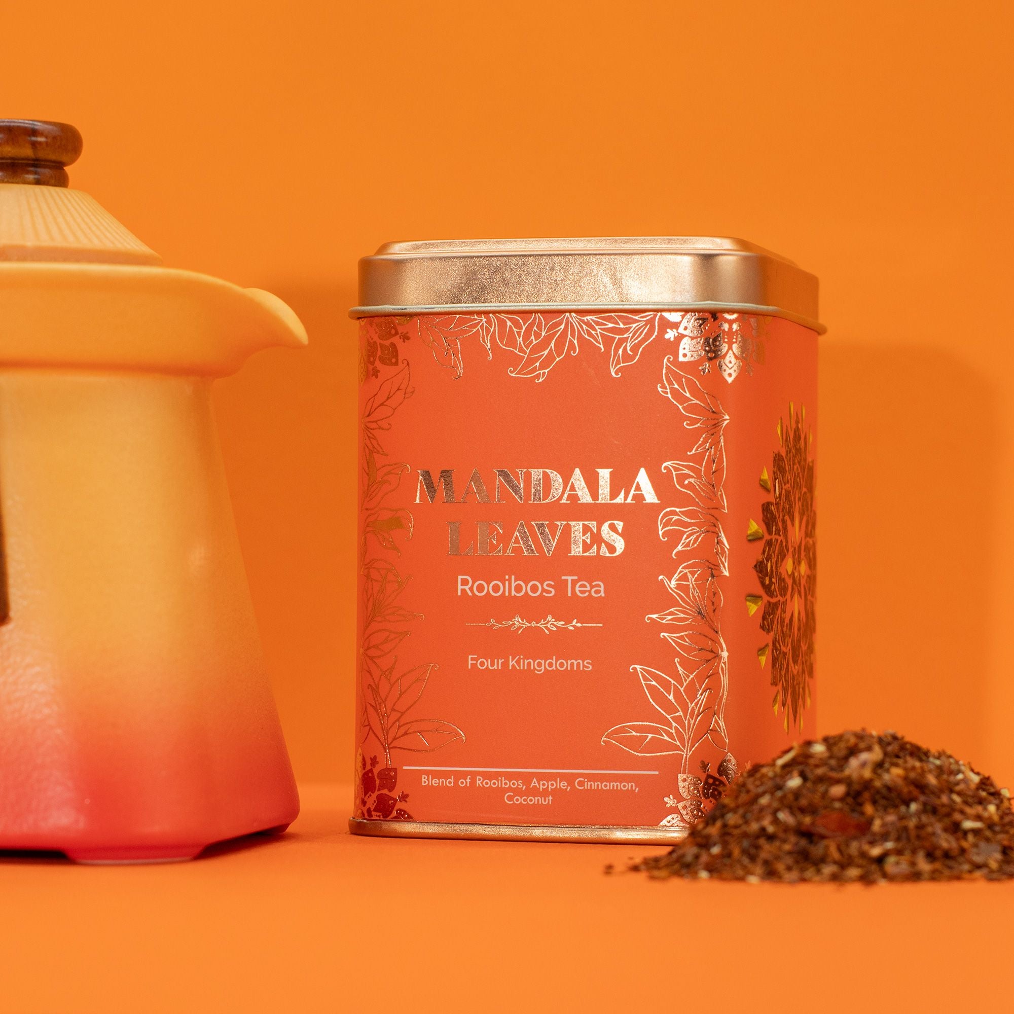 Mandala Leaves Rooibos Tea canister with tea leaves on an orange background