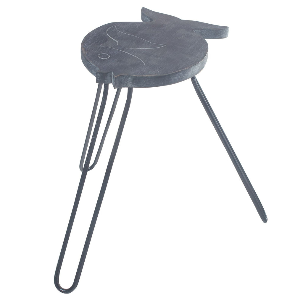 Small round stool with a fish design on a white background