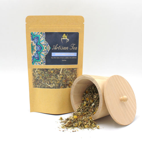 Artisan tea package with a wooden container on a white background