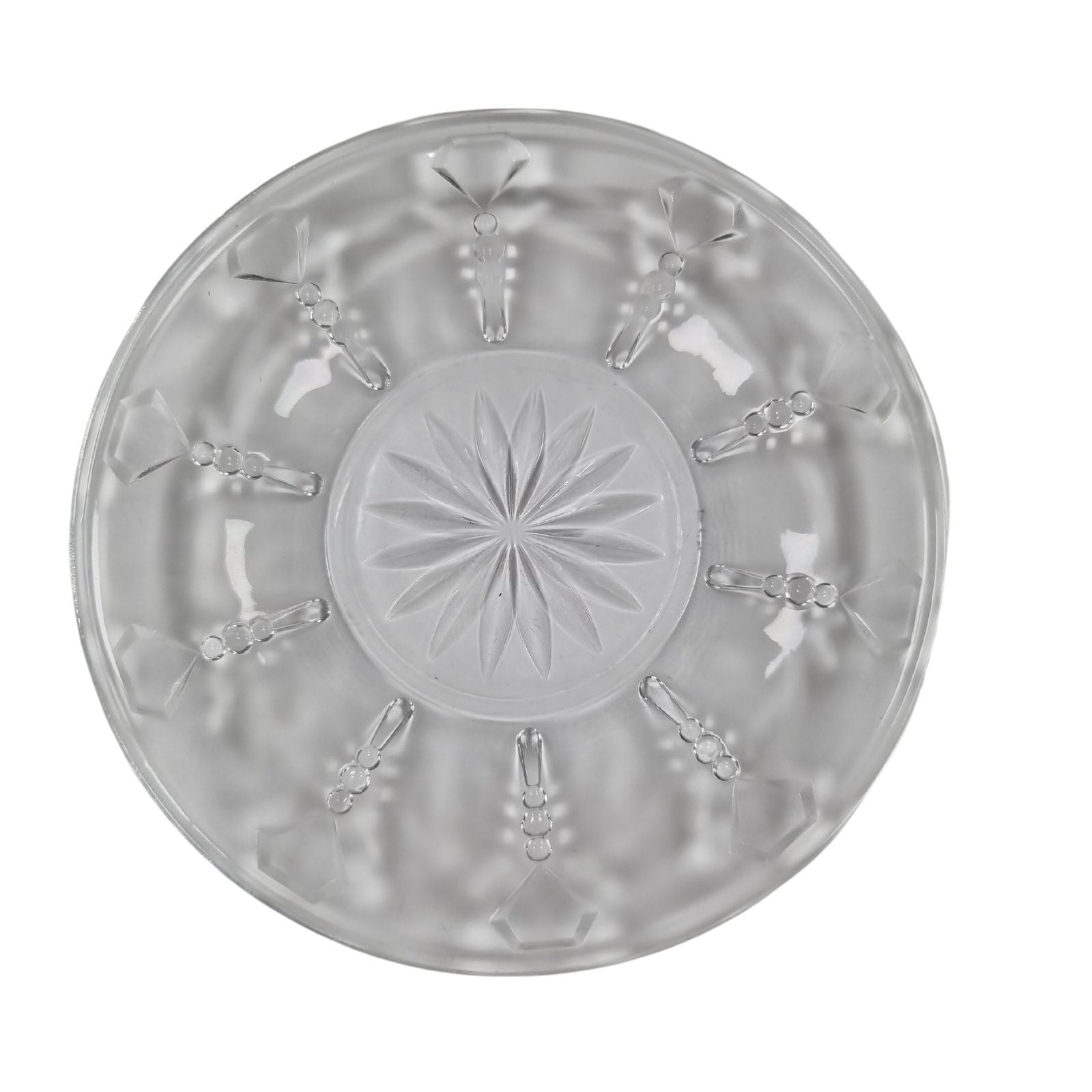 Clear glass plate with star-shaped cutout on a white background