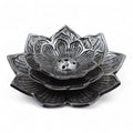 Decorative metal lotus flower on a white background