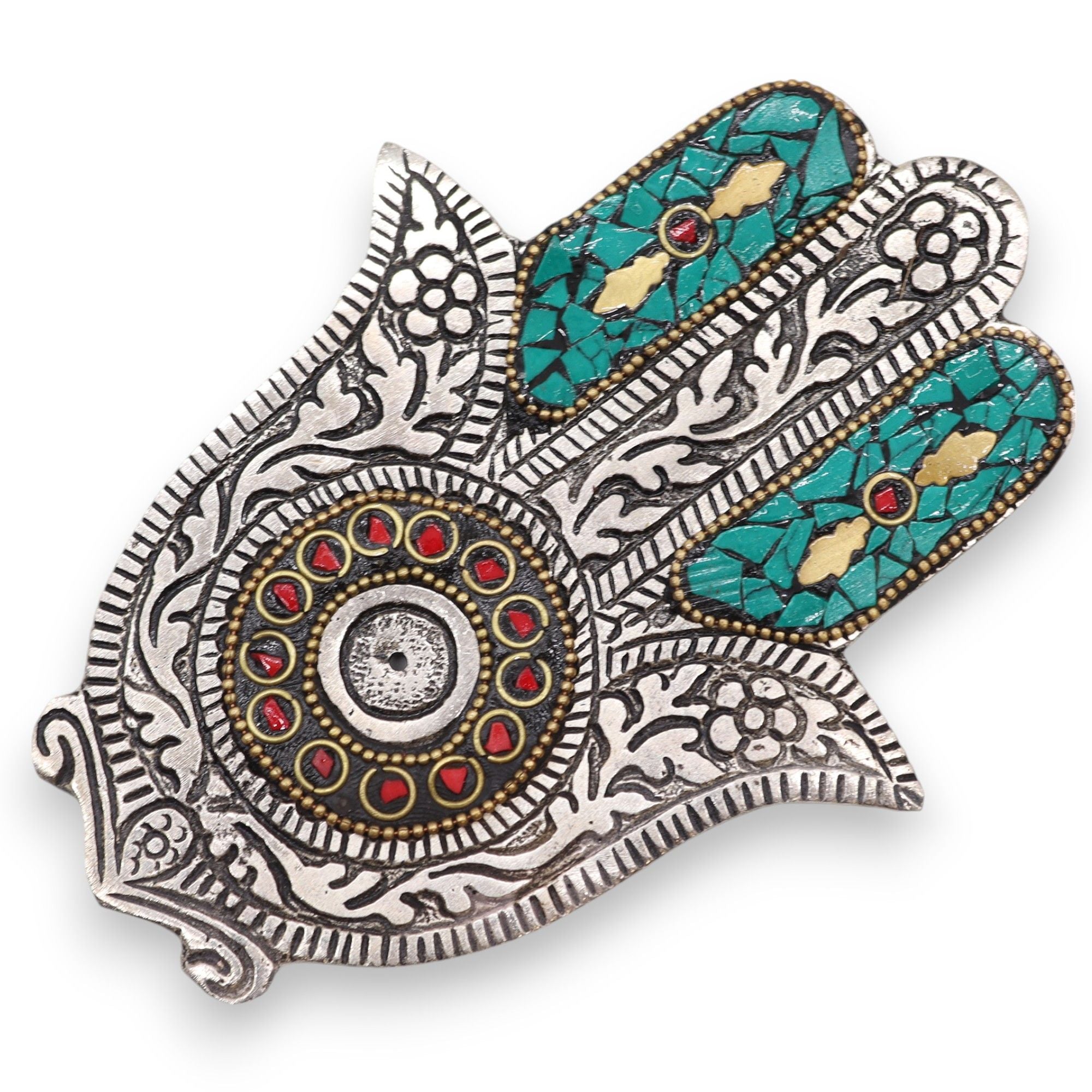 Decorative Hamsa hand with intricate patterns and colorful stones on a white background